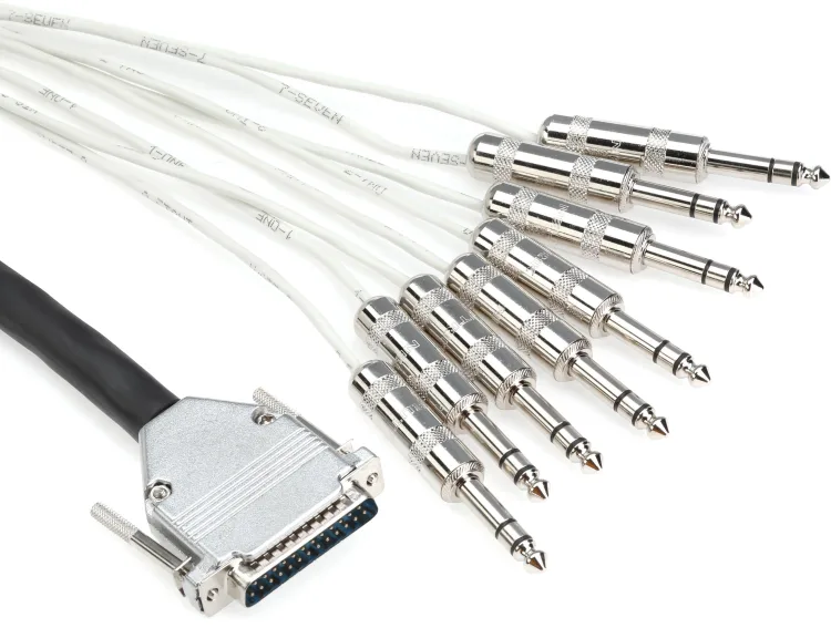 A DB25-to-8×TRS fan cable. One DB25 male connector on one end, fanning out to eight 1/4-inch TRS plugs on the other end, each labeled with its channel number.